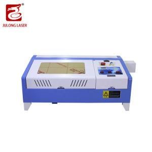 Liaocheng Factory Supply 3020 320 300*200mm 50W CO2 Laser Cutting Engraving Machine for Acrylic Wood Leather Fabric Paper