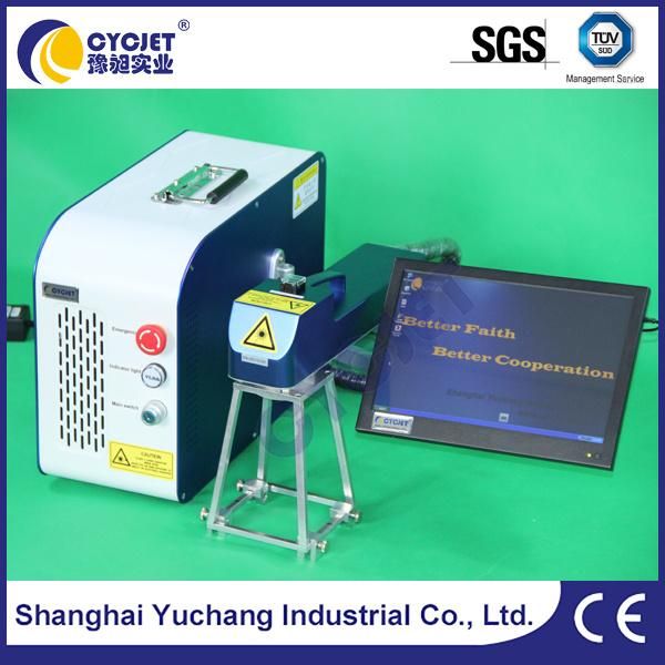 Portable Handheld Laser Marking Machine Printing on Rubber Tires