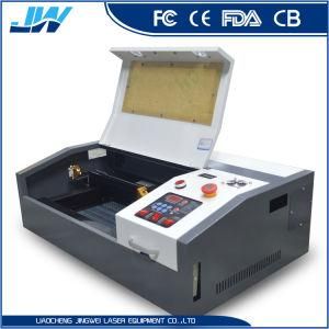 Laser Engraving and Cutting Machine CO2 50W Phone Membrane Machine