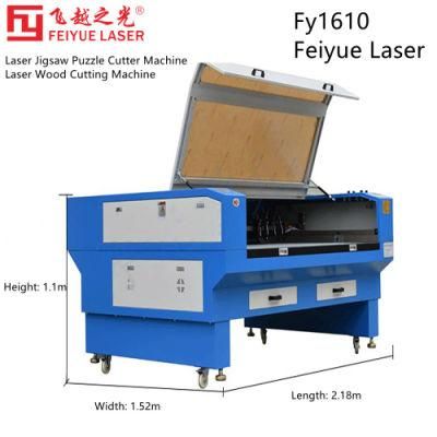 Fy1610 Feiyue Laser Jigsaw Puzzle Cutter Machine Price Die Cut Puzzle CO2 Laser Cutter Laser Wood Cutting Machine