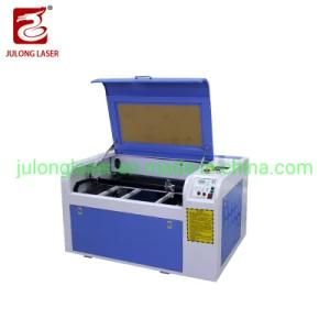 New Style Ruida Julong 6040 Laser Cutting Machine Laser Engraving Machine with Electric up and Down Table