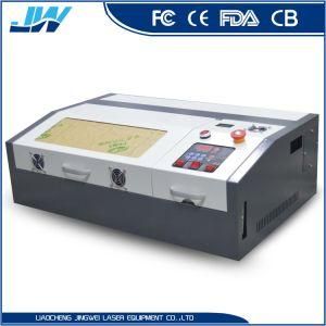 CO2 Laser Mobile Phone Cutting Film Engraving Cutting Machine 40W