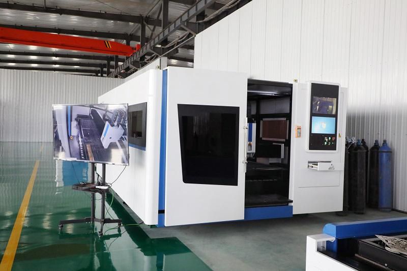 High Power CNC Automatic Autofocus Laser Head Enclosed Fiber Laser Cutter Cutting Machine with Exchange Table and Cover