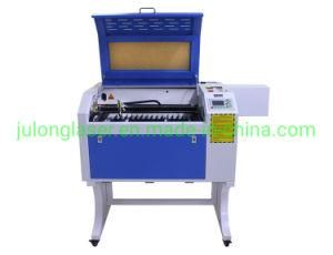 Hot Sale 60W 6040 with Electric up and Down Table Laser Cutting or Engraving Machine for Wooden, Acrylic.