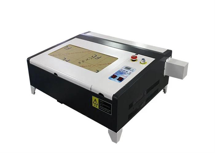 China Good Quality and Low Cost 40 X 40 Cm Desktop 40watt CO2 Laser Engraving Cutting Machine