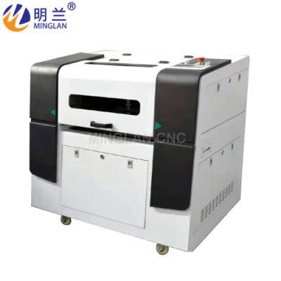 9060 CO2 Laser Engraving and CNC Cutting Machine