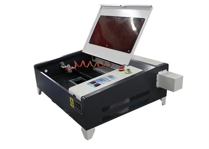 China Good Quality and Low Cost 40 X 40 Cm Desktop 40watt CO2 Laser Engraving Cutting Machine