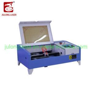 Laser Cutting Machine 40W Mobile Phone Screen Protector Black Machine Casing.